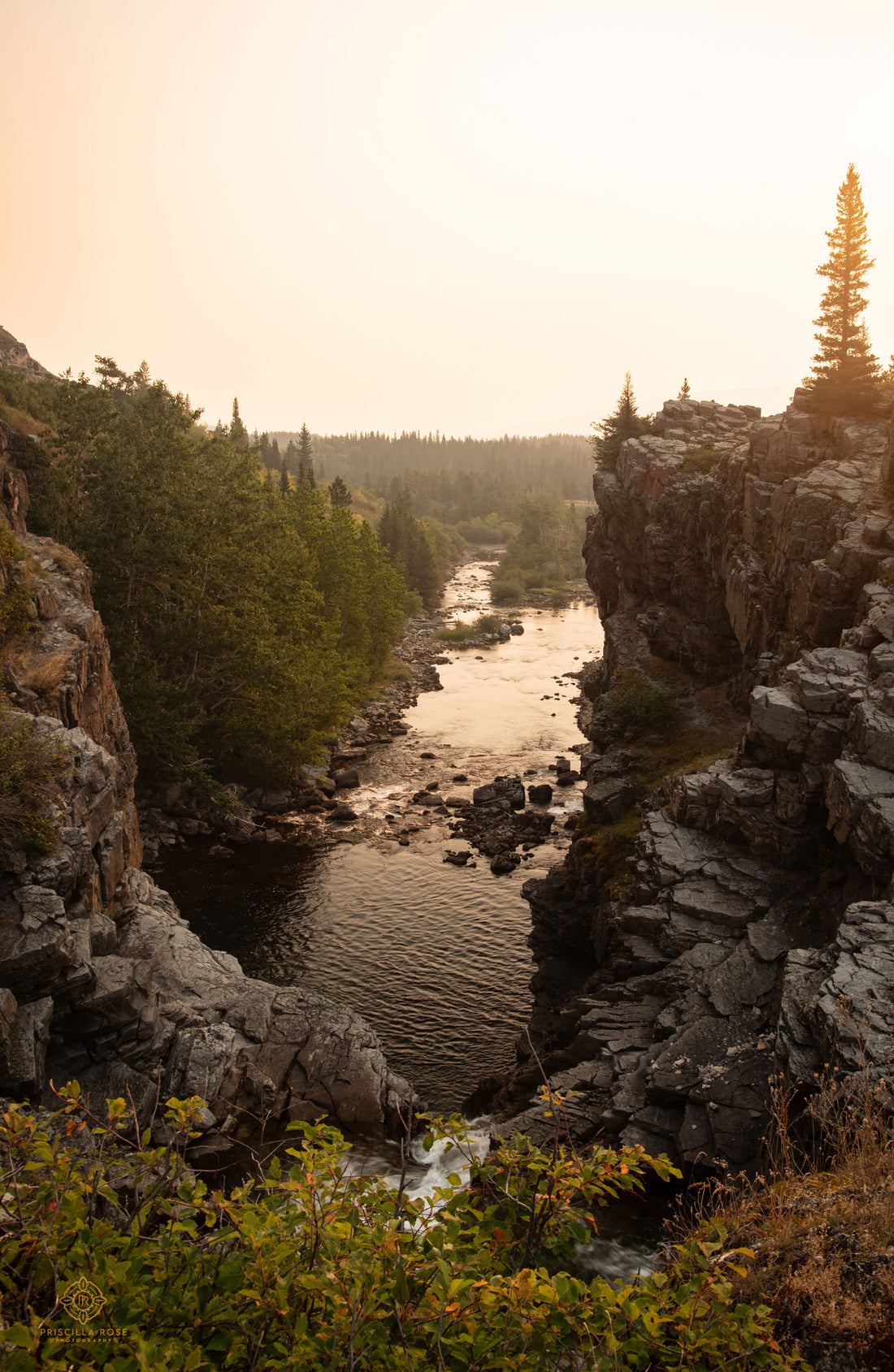 A Smokey Sunrise at Swiftcurrent Falls